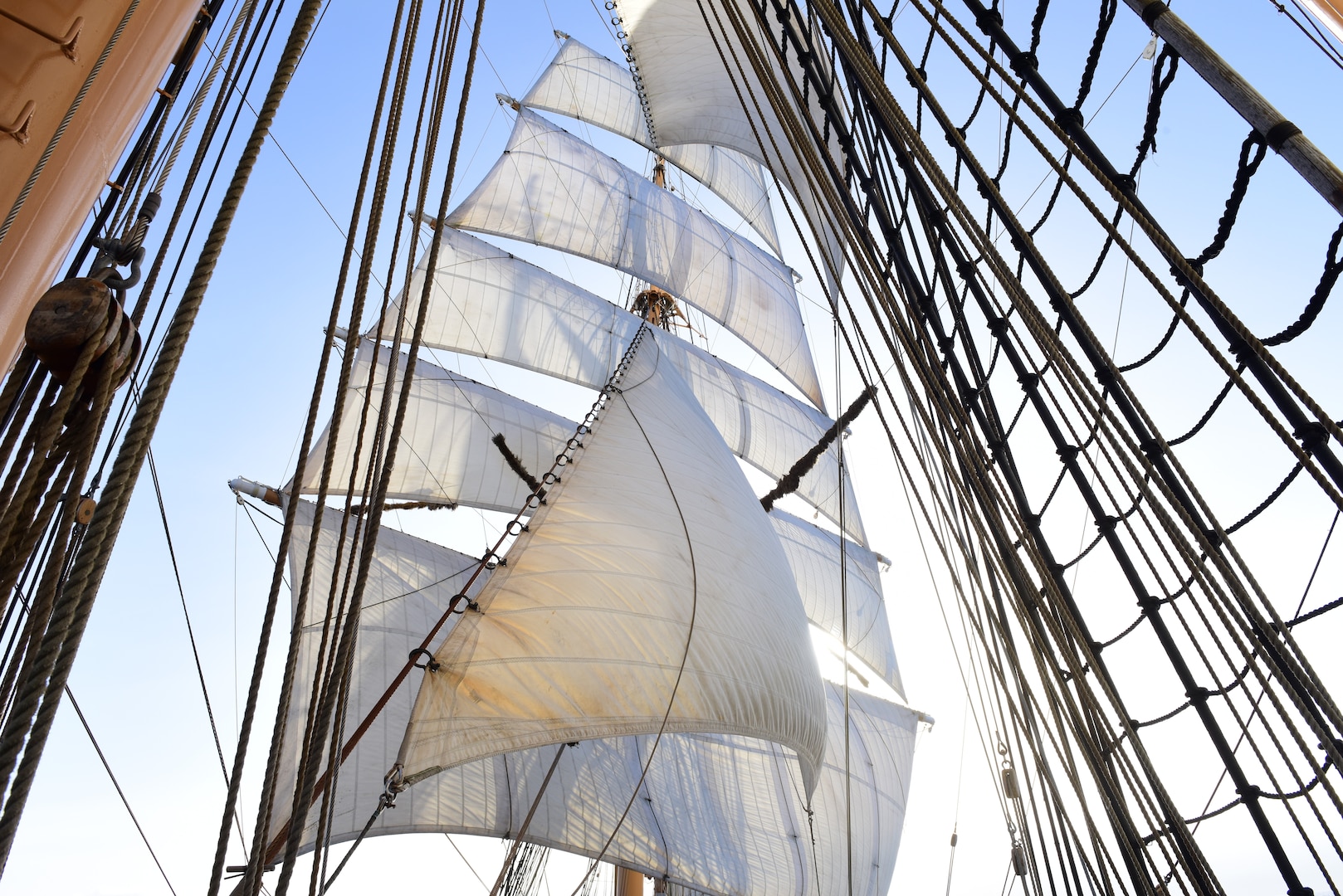 USCGC Eagle (WIX 327) makes way under sail, April 28, 2023, in the Atlantic Ocean. Eagle conducted a four-month summer deployment, sailing across the Atlantic Ocean, to teach practical seamanship skills to officer candidates from the U.S. Coast Guard and National Oceanic and Atmospheric Administration Corps, foreign military personnel, and shared best practices with sailing organization Tall Ships America, while cadets and crew facilitated diplomatic engagements with U.S. allies in Northern Europe, the Portuguese archipelagoes of the Azores and Madeira, and Bermuda. (U.S. Coast Guard photo by Petty Officer 2nd Brandon Hillard)