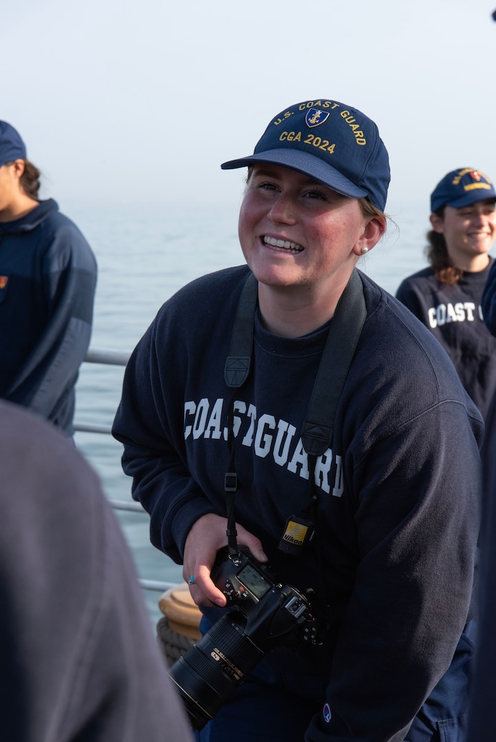 Coast Guard Academy Cadet Cassie Eagle acts as the cadet public affairs officer aboard USCGC Eagle (WIX 327), June 23, 2023, while transiting the English Channel. The Eagle is a tall ship used as a training platform for future Coast Guard Academy officers as well as a vessel utilized for establishing and maintaining domestic and international relationships. (U.S. Coast Guard photo by Petty Officer 3rd Class Carmen Caver)