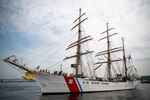 The crew of the Coast Guard Barque Eagle (WIX 327) returns to homeport in New London, August 10, 2023. This year, crew, cadets, and officer candidates sailed over 16,800 nautical miles, traveling to the Azores, Netherlands, Norway, Denmark, Finland, and Sweden as part of their annual training cruise, after departing New London, April 8, 2023. (U.S. Coast Guard Photo by Petty Officer 2nd Class Taylor Bacon)