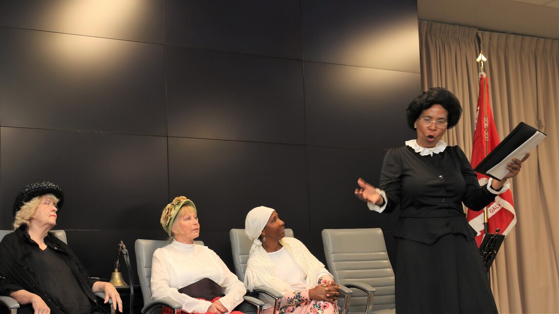 The “Suffragettes”, historical advocates for women’s rights, from right, Rebecca Marks Jimerson portrayed both Mary Church Terrell and Ida B. Wells, Dr. Rose Caballero, Galveston District Equal Employment Opportunity officer, as Sojourner Truth, Marcy Hanson as Elizabeth Cady Stanton and Marilyn Harris as Susan B. Anthony, shared the story of the Seneca Falls Convention of 1848, the first convention to promote women’s right to vote, and the decades of protesting it took to pass the 19th Amendment.