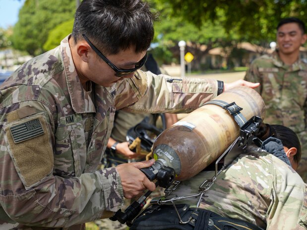Joint Task Force-Red Hill (JTF-RH) roving security and fire watch team members conduct Self-Contained Breathing Apparatus (SCBA) training on Ford Island, Honolulu, Hawaii, August 9, 2023. JTF-RH is in phase three of its five-phase defueling plan. Personnel are focused on completing quality control tasks, training, response preparation, the National Environmental Policy Act Environmental Assessment, regulatory approvals and operational planning for all major milestones. This extensive preparatory work will help ensure the safe and expeditious defueling of the Red Hill Bulk Fuel Storage Facility. (DoD photo by U.S. Marine Corps Cpl. Gabrielle Zagorski)