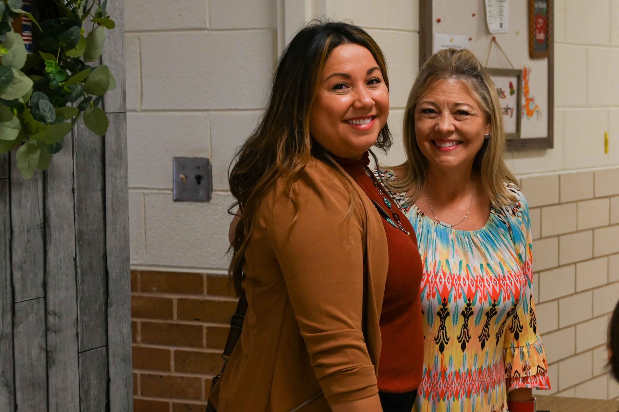 Gwendolyn Brakebill (left), 97th Force Support Squadron school liaison program manager, smiles with Sheila Huckaby, a second-grade teacher at L. Mendel Rivers Elementary School, Altus, Oklahoma, Aug. 7, 2023. Brakebill is also the science, technology, engineering, and math representative for the 97th Air Mobility Wing. (U.S. Air Force photo by Airman 1st Class Kari Degraffenreed)