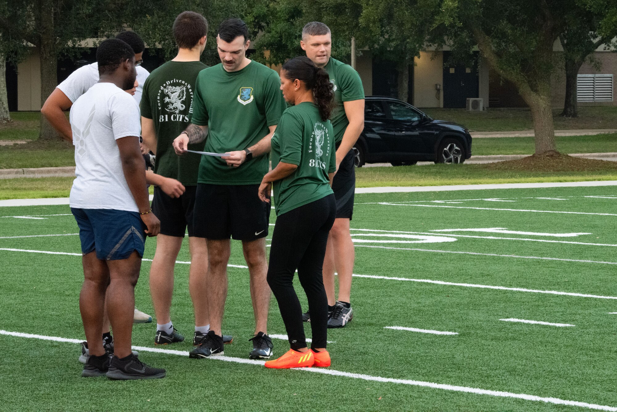 U.S. Air Force Staff Sgt. Cody Moss, 81st Comptroller Squadron unit deployment manager, briefs the day's exercise on the Multi-Purpose Turf Field at Keesler Air Force Base, Mississippi, July 28, 2023.