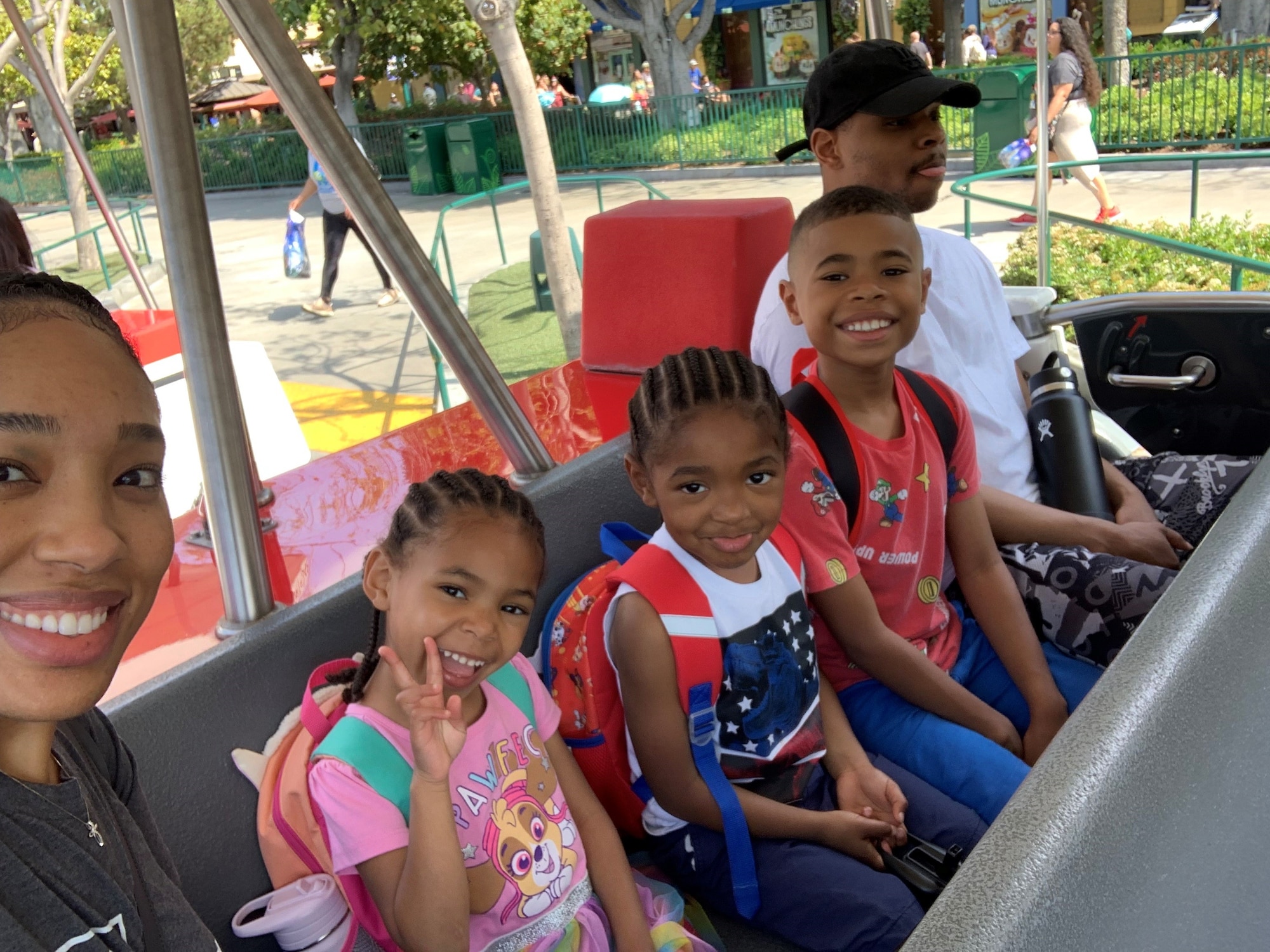 Tech Sgt. Bionca Thomas, Detachment 2 of the 9th Operations Group, takes a photo with her family on a recent vacation. Setting the bar high with an unwavering "fly, fight, and win" attitude, Thomas carved her name in the annals of exceptional accomplishments by successfully earning her Ph.D. in 2022.