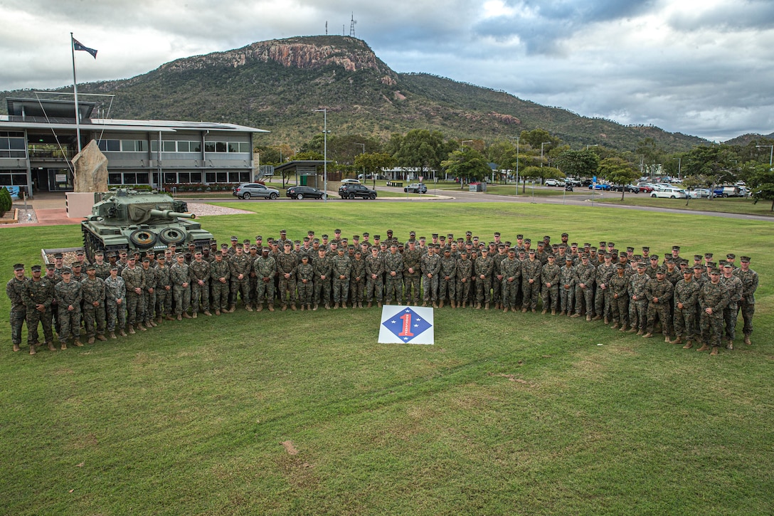 U.S. Marines deployed with 1st Marine Division pose for a photo during Exercise Talisman Sabre 23 at Lavarack Barracks in Townsville, Australia, July 27, 2023. Talisman Sabre is the largest bilateral military exercise between Australia and the United States advancing a free and open Indo-Pacific by strengthening relationships and interoperability among key Allies and enhancing our collective capabilities to respond to a wide array of potential security concerns. (U.S. Marine Corps photo by Cpl. Emeline Molla)