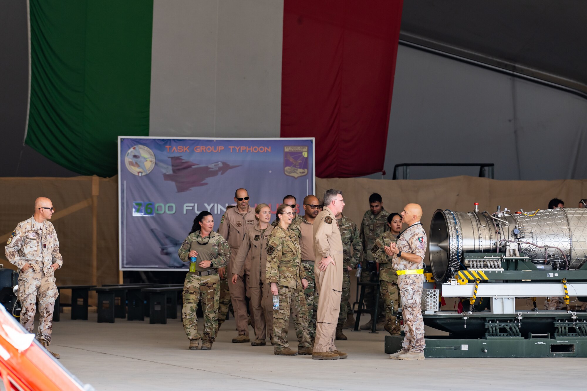 U.S. Air Force service members assigned to the 386th Air Expeditionary Wing learn about the Italian Air Force Eurofighter Typhoon and its mission at Ali Al Salem Air Base, Kuwait, Aug. 4, 2023. Our Italian Air Force counterparts opened their doors to all of the coalition partners here for this unique educational opportunity, increasing the interoperability of our forces and enhancing our ability to project decisive combat power together across the theater. (U.S. Air Force photo by Staff Sgt. Kevin Long)
