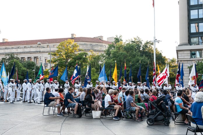 The U.S. Navy Ceremonial Guard presents the colors before the Navy Band plays its Concert on the Avenue (COTA) at the Navy Memorial in Washington, D.C. Vice Admiral Johnny Wolfe Jr., director of U.S. Navy Strategic Systems Programs (SSP) hosted the concert, played by the Navy Band for the public, which featured the storyline and history of the Navy set to the tune of patriotic music (U.S. Navy Photo by Lt. Jennifer Bowman)