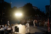 Picture of Vice Admiral Johnny Wolfe Jr., director of U.S. Navy Strategic Systems Programs (SSP) dancing with his wife during the U.S. Navy Band's Concert on the Avenue (COTA) at the Navy Memorial in Washington, D.C. Vice Adm. Wolfe hosted the concert, played by the Navy Band for the public, which featured the storyline and history of the Navy set to the tune of patriotic music (U.S. Navy Photo by Lt. Jennifer Bowman)