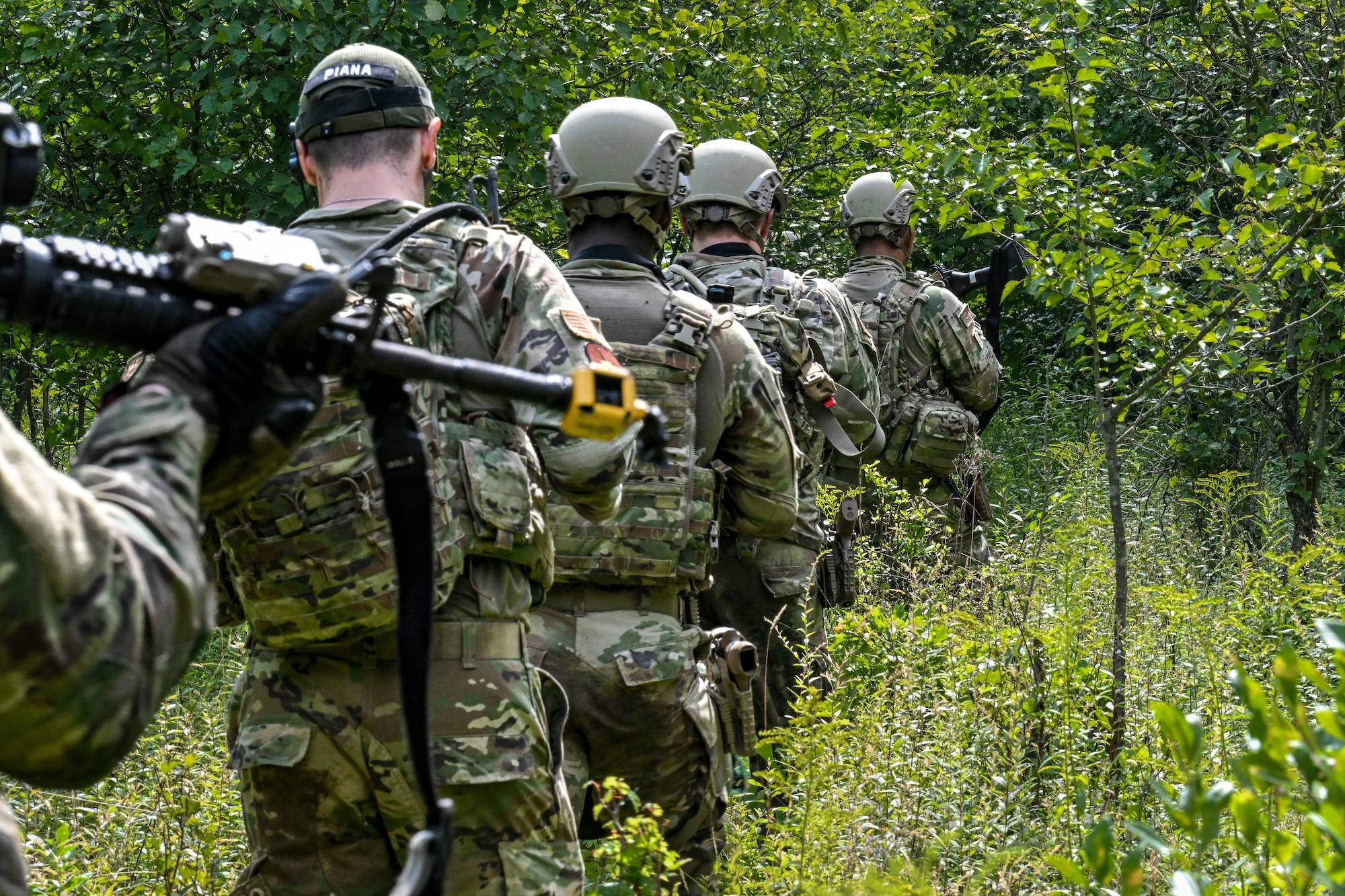Defenders assigned to the North Carolina Air National Guard's 145th Security Forces Squadron begin navigating their way during an Integrated Defense Leadership Course training exercise on July 27, 2023, at Camp James A. Garfield Joint Military Training Center, Ohio.
