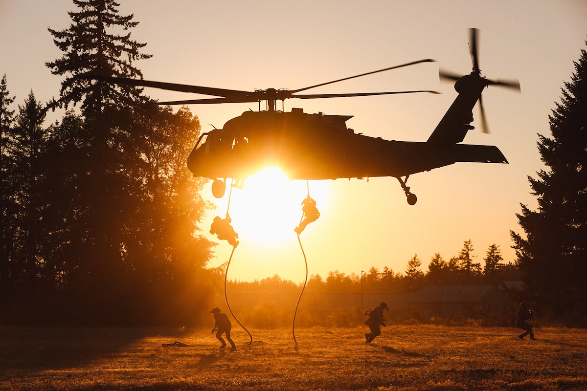 Soldiers assigned to the 2nd Battalion, 75th Ranger Regiment conduct fast rope insertion training from a UH-60M Black Hawk helicopter at Joint Base Lewis-McChord, Wash., Aug. 3, 2023.