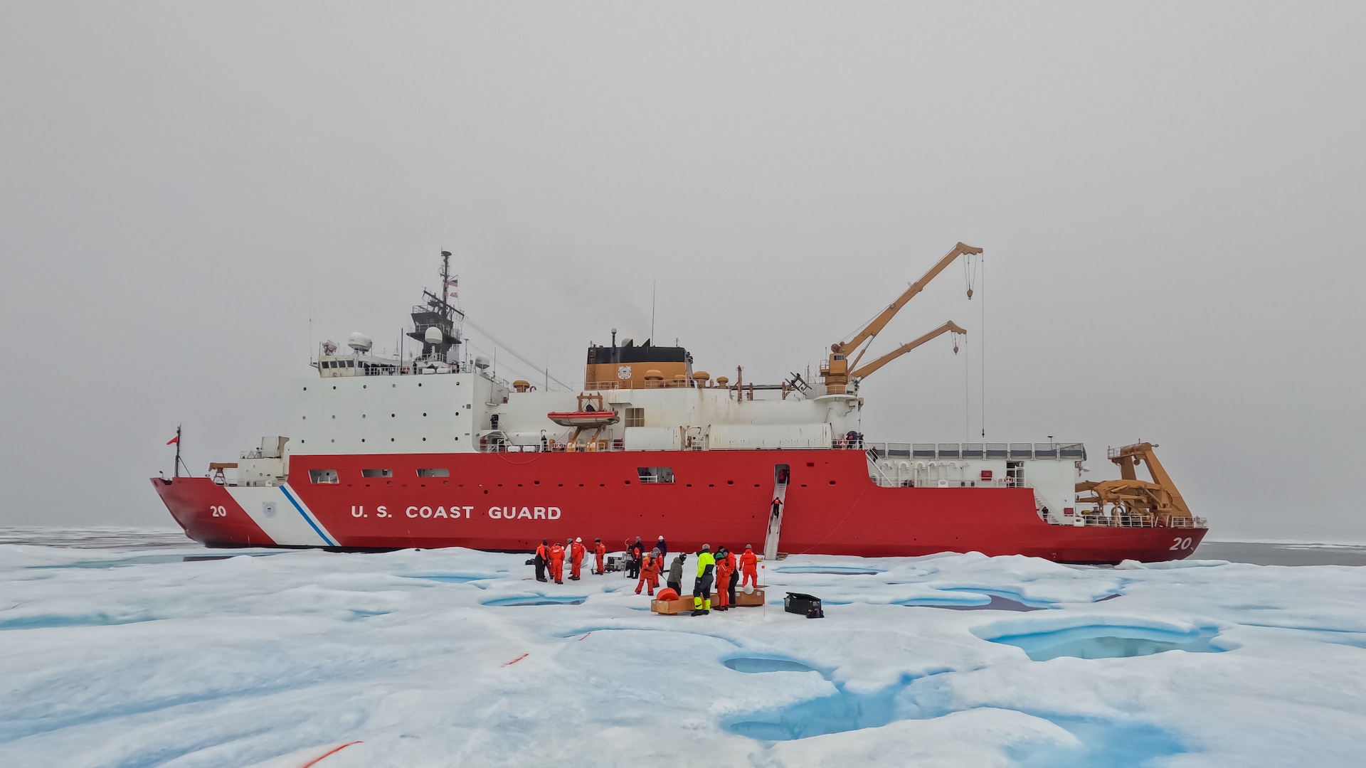 A U.S. Coast Guard Cutter Healy (WAGB 20) station keeps alongside a multi-year ice floe while a team of crew and researchers install equipment in the Beaufort Sea, Aug. 6, 2023. The Healy is ideal for science and research projects like the Arctic Mobile Observing System; providing access to the most remote reaches of the Arctic Ocean; areas barricaded by pack ice and insurmountable by most research vessels. (Coast Guard photo by Petty Officer 3rd Class Briana Carter)