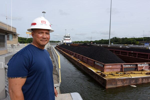 Lock Operator Tony Certeza works Aug. 8, 2023, to lock through the Motor Vessel H.B. Stewart with barges of coal at Old Hickory Lock on the Cumberland River in Old Hickory, Tennessee. He recently returned from a deployment to Guam in the aftermath of Typhoon Mawar that devastated his native island in late May. (USACE Photo by Lee Roberts)