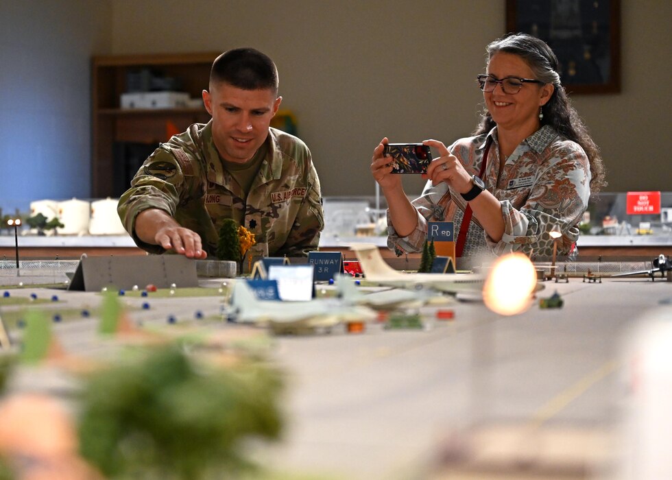 Dr. Wendy Walsh, Air Education and Training Command chief learning officer, takes a photo at the Louis F. Garland Department of Defense Fire Academy, Goodfellow Air Force Base, Texas, Aug. 8, 2023. Walsh toured the 312th Training Squadron; Joint All Domain Exercise, Forward Operations Readiness Generation Exercise and got a closer look at the mission of the intelligence training squadrons. (U.S. Air Force photo by Senior Airman Sarah Williams)