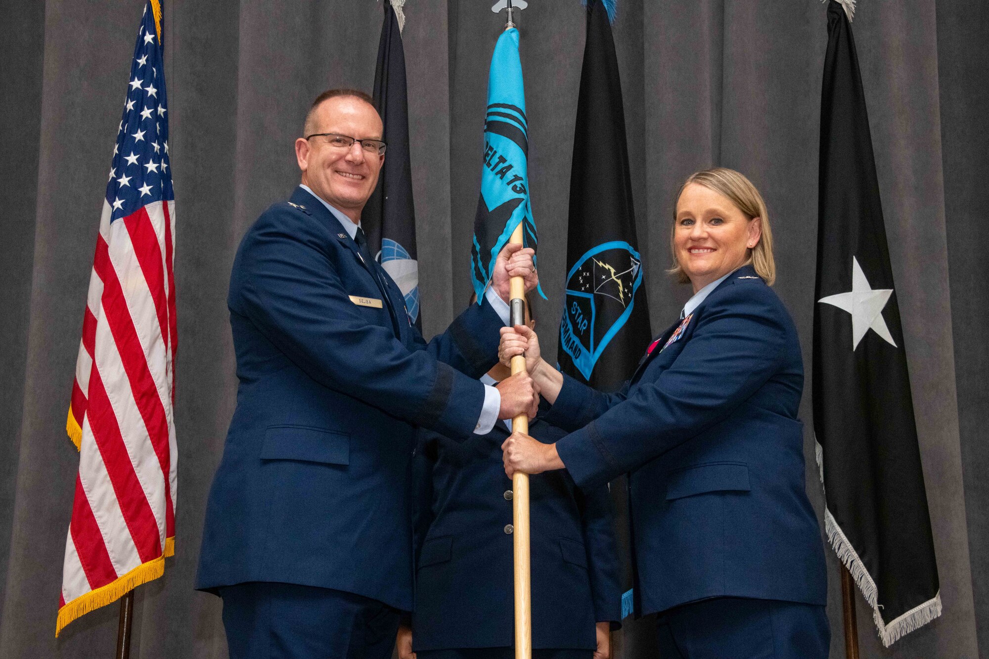 U.S. Space Force Col. Niki Lindhorst, outgoing Delta 13 commander, right, relinquishes command of Delta 13 during a change of command ceremony at Maxwell Air Force Base, Ala., Aug. 4, 2023. Delta 13 is the U.S. Space Force's Delta responsible for space education. (U.S. Air Force photo by Sean Ross)