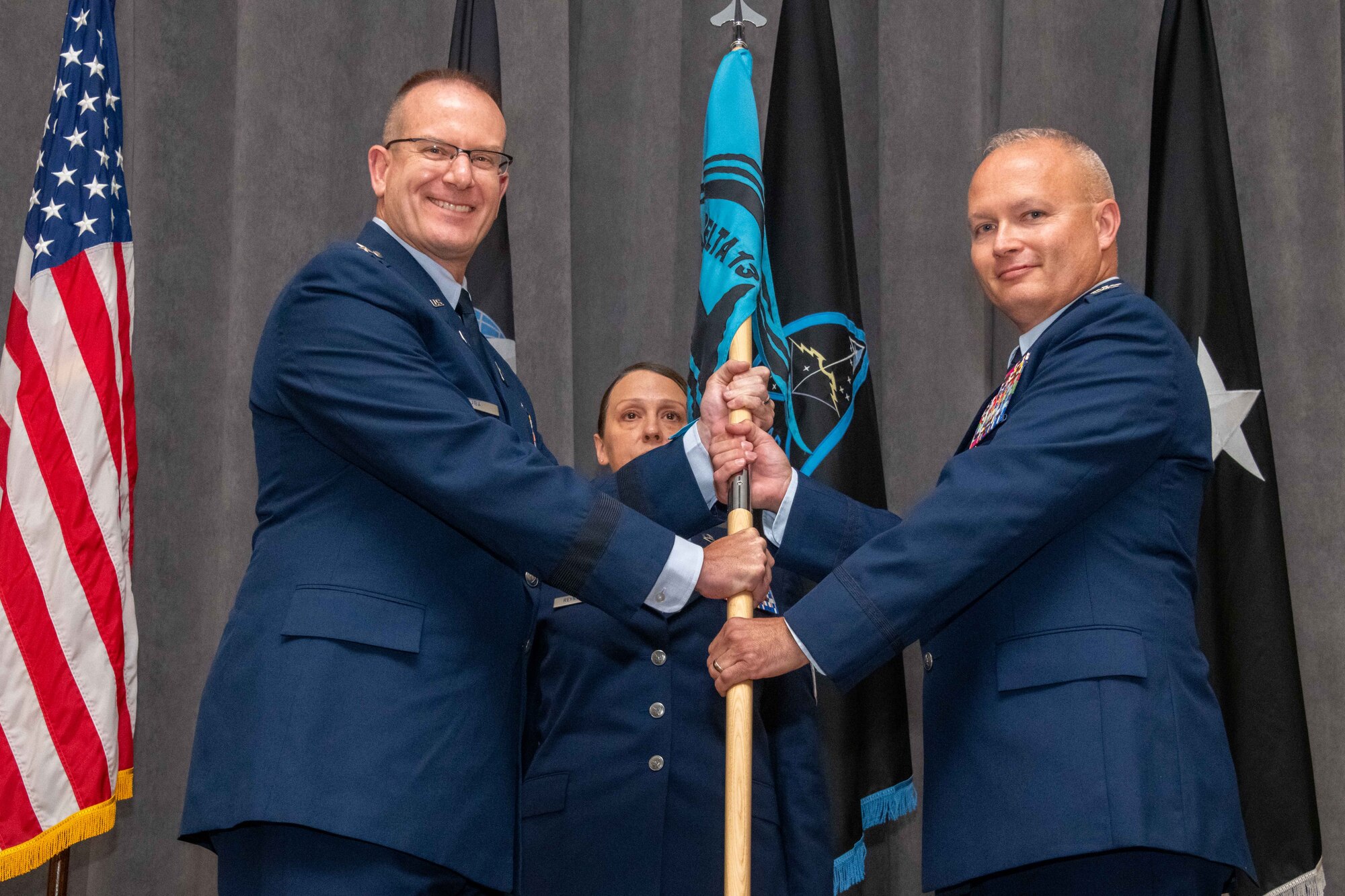 U.S. Space Force Col. Bryan Dutcher, Delta 13 commander, right, assumes commander of Delta 13 during a change of command ceremony at Maxwell Air Force Base, Ala., Aug. 4, 2023. Delta 13 is the U.S. Space Force's Delta responsible for space education. (U.S. Air Force photo by Sean Ross)