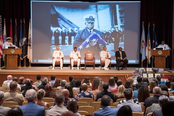 Fleet Command Master Chief Huben Phillips gives remarks during his retirement ceremony, Aug. 11, 2023.