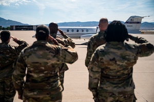 people salute plane