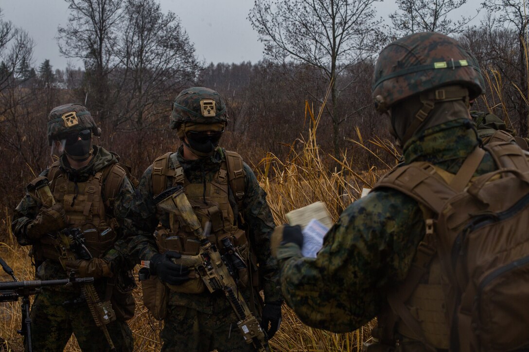U.S. Marines with 3d Battalion, 8th Marine Regiment, are briefed on patrols during exercise Forest Light 21 in the Niigata Prefecture, Japan, on Dec. 13, 2020. Forest Light is an annual bilateral training exercise that strengthens the interoperability and readiness of the U.S. Marine Corps and Japan Ground Self-Defense Force to deter aggression and defeat any threat. This iteration is focused on seizing and defending key maritime terrain as an integrated force in support of naval operations in the defense of Japan. 3/8 is forward-deployed in the Indo-Pacific under 3d Marine Division. (U.S. Marine Corps photo by Lance Cpl. Jonathan Willcox)