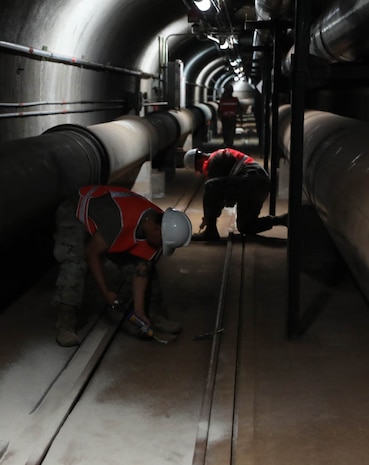 Service members assigned to Joint Task Force-Red Hill (JTF-RH) apply sealant to drain plugs during the implementation of additional aquifer protective measures at the Red Hill Bulk Fuel Storage Facility (RHBFSF), Halawa, Hawaii, Aug. 10, 2023. JTF-RH is in phase three of its five-phase defueling plan. Personnel are focused on completing quality control tasks, training, response preparation, the National Environmental Policy Act Environmental Assessment, regulatory approvals and operational planning for all major milestones. This extensive preparatory work will help ensure the safe and expeditious defueling of the RHBFSF. (DoD photo by U.S. Army Staff Sgt. Randall E. Corpuz)