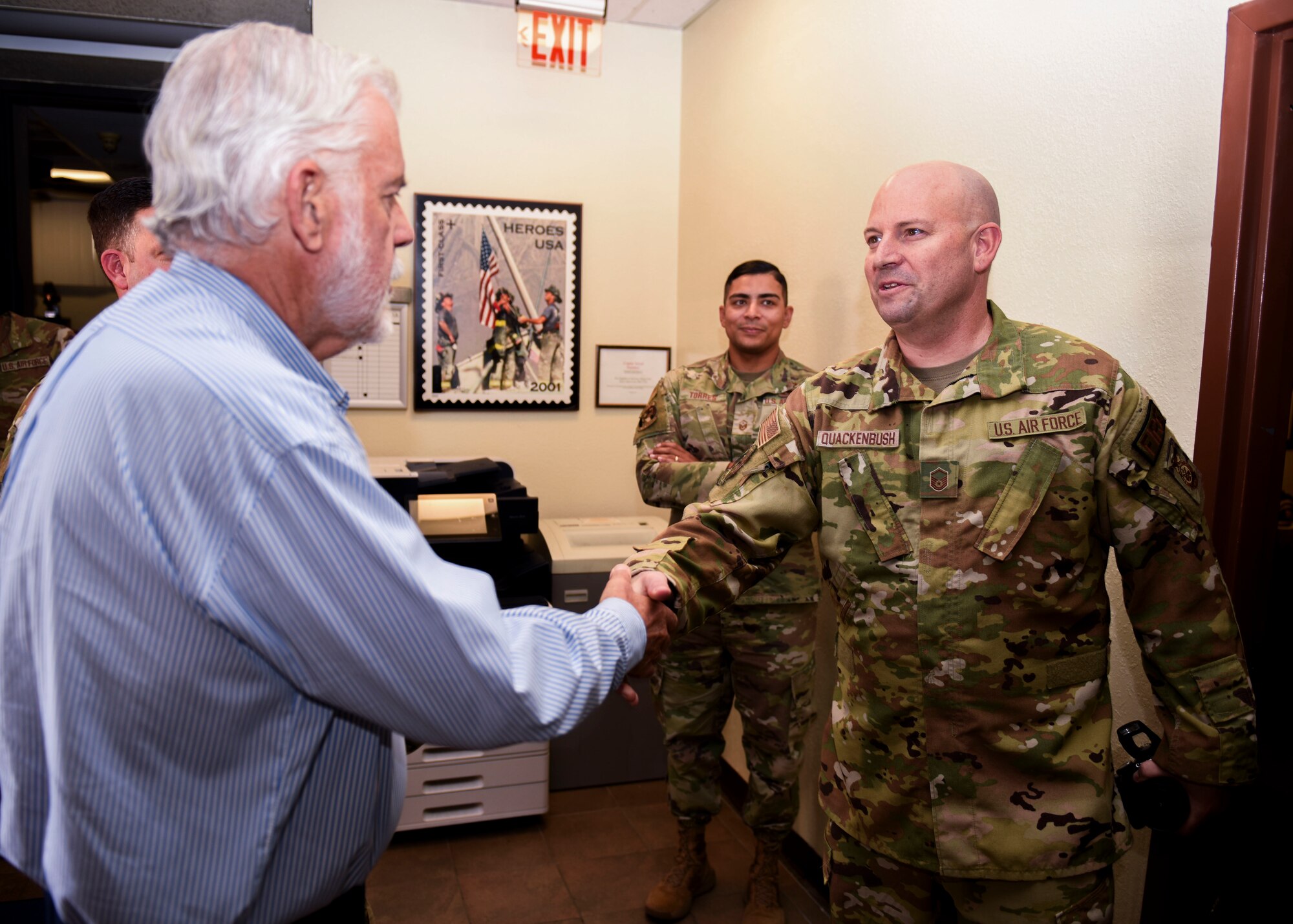 U.S. Air Force Master Sgt. Matthew Quackenbush, 56th Civil Engineer Squadron battalion chief, greets Jerry P. Weiers, Mayor of Glendale, Arizona as he visits the Luke Air Force Base Fire Department Aug. 9, 2023, at Luke AFB, Arizona.