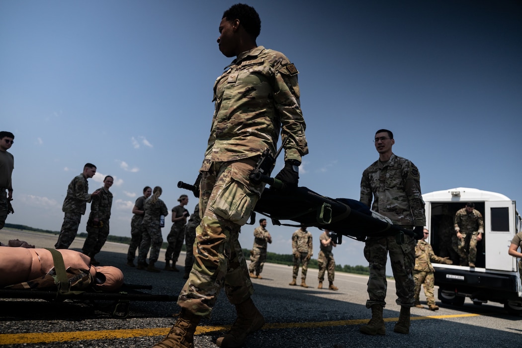 436th Medical Group Airmen train on patient load and offload procedures during MEDIC-X training held at Dover Air Force Base, Delaware, Aug. 9, 2023. MEDIC-X is the Air Force Surgeon General’s Multi-Capable Airmen initiative to ensure all medical personnel, clinical and non-clinical, are equipped with life-sustaining skills needed for future conflicts where resources may be limited. (U.S. Air Force photo by Staff Sgt. Marco A. Gomez)