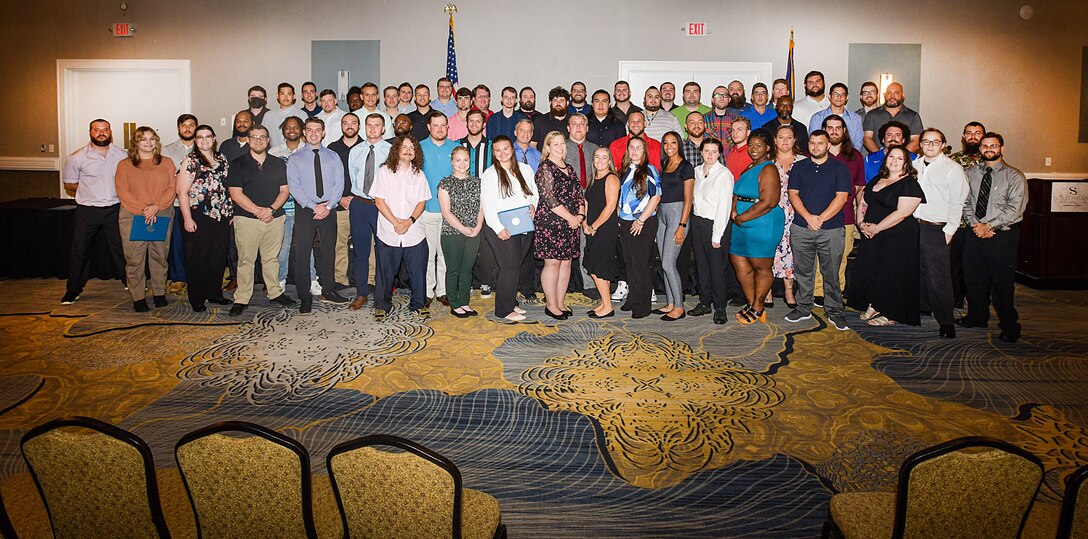 230804-N-DG679-178
JACKSONVILLE, Fla. (Aug. 4, 2023) A group of new journey-level artisans who graduated from Fleet Readiness Center Southeast’s (FRCSE) Trades Apprenticeship Program pose for a photo after receiving their certificates of completion. FRCSE launched the renewed apprenticeship program in 2019, a combination work-study program that provides apprentices with a competitive wage and benefits while learning a journey-level trade. (U.S. Navy Photo by Toiete Jackson/Released)