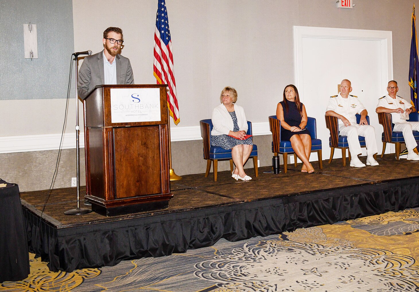 Kameron Murphy, a newly designated journey-level sheet metal mechanic with Fleet Readiness Center Southeast (FRCSE), addresses the audience after receiving his certificate of completion during FRCSE’s 2023 apprentice graduation ceremony at Southbank Hotel Jacksonville Riverwalk. FRCSE launched the renewed apprenticeship program in 2019, a combination work-study program that provides apprentices with a competitive wage and benefits while learning a journey-level trade. (U.S. Navy Photo by Toiete Jackson/Released)