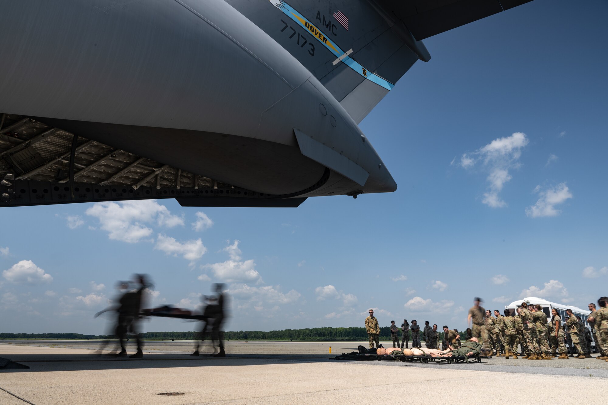 Airmen from the 142nd Aeromedical Evacuation Squadron, Delaware Air National Guard Base, New Castle, Delaware, train 436th Medical Group medics on patient load and offload procedures onto a C-17 Globemaster III during MEDIC-X training held at Dover Air Force Base, Delaware, Aug. 9, 2023. MEDIC-X is the Air Force Surgeon General’s Multi-Capable Airmen initiative to ensure all medical personnel, clinical and non-clinical, are equipped with life-sustaining skills needed for future conflicts where resources may be limited. (U.S. Air Force photo by Staff Sgt. Marco A. Gomez)