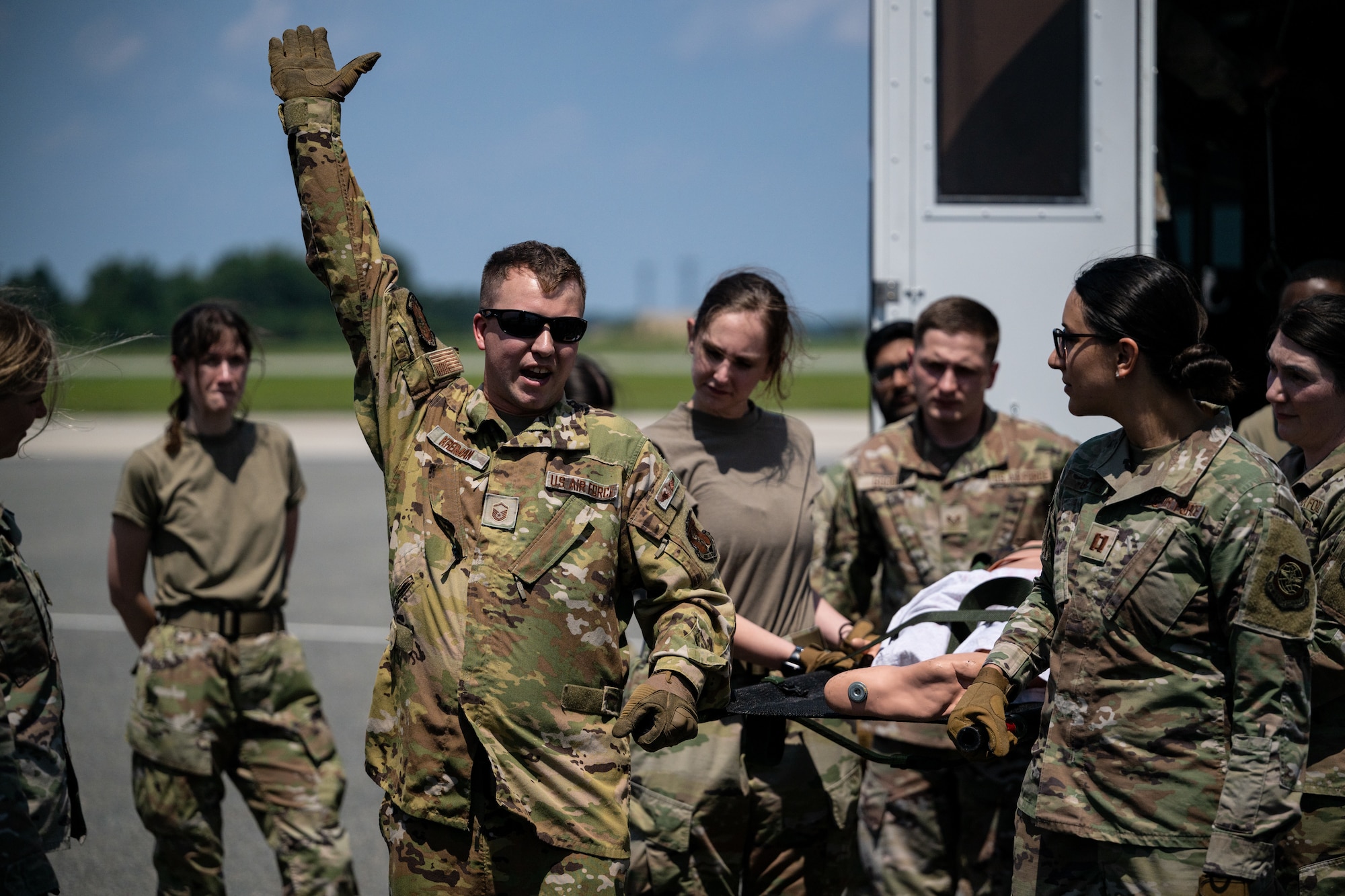 Master Sgt. James Kreiman, 142nd Aeromedical Evacuation Squadron aeromedical evacuation technician, Delaware Air National Guard Base, New Castle, Delaware, instructs 436th Medical Group Airmen on procedures for patient evacuation on a stretcher during MEDIC-X training held at Dover Air Force Base, Delaware, Aug. 9, 2023. MEDIC-X is the Air Force Surgeon General’s Multi-Capable Airmen initiative to ensure all medical personnel, clinical and non-clinical, are equipped with life-sustaining skills needed for future conflicts where resources may be limited. (U.S. Air Force photo by Staff Sgt. Marco A. Gomez)