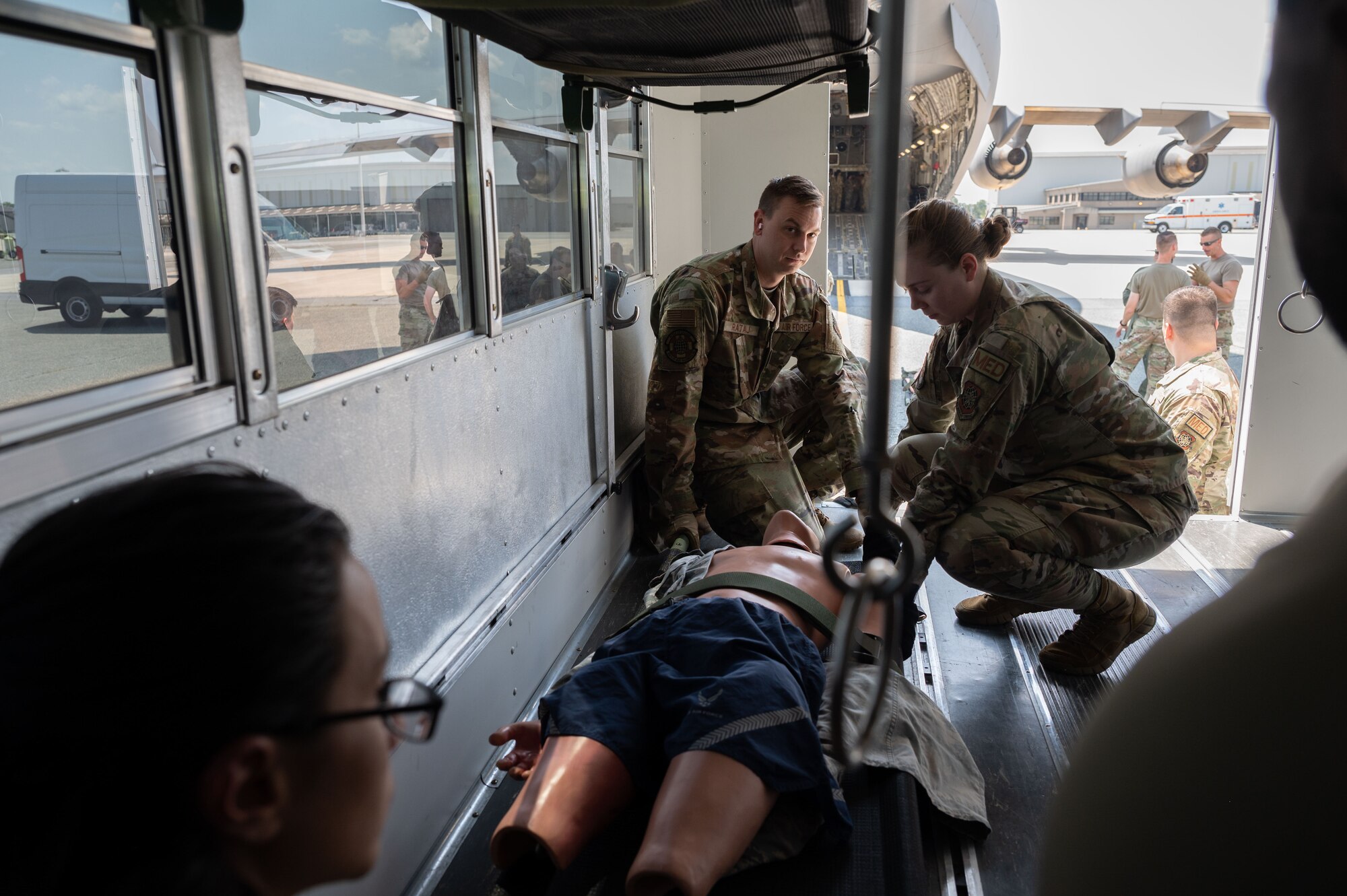 Team Dover Airmen take part in Aeromedical Evacuation training during a MEDIC-X exercise held at Dover Air Force Base, Delaware, Aug. 9, 2023. MEDIC-X is the Air Force Surgeon General’s Multi-Capable Airmen initiative to ensure all medical personnel, clinical and non-clinical, are equipped with life-sustaining skills needed for future conflicts where resources may be limited. (U.S. Air Force photo by Airman 1st Class Dieondiere Jefferies)
