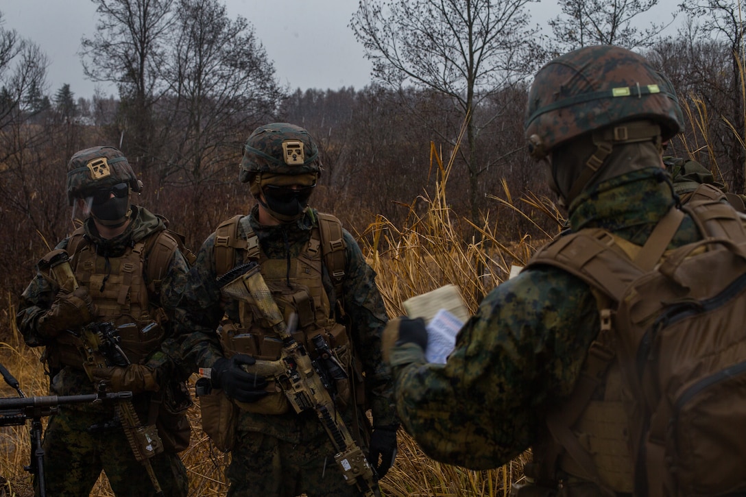 U.S. Marines with 3d Battalion, 8th Marine Regiment, are briefed on patrols during exercise Forest Light 21 in the Niigata Prefecture, Japan, on Dec. 13, 2020. Forest Light is an annual bilateral training exercise that strengthens the interoperability and readiness of the U.S. Marine Corps and Japan Ground Self-Defense Force to deter aggression and defeat any threat. This iteration is focused on seizing and defending key maritime terrain as an integrated force in support of naval operations in the defense of Japan. 3/8 is forward-deployed in the Indo-Pacific under 3d Marine Division. (U.S. Marine Corps photo by Lance Cpl. Jonathan Willcox)
