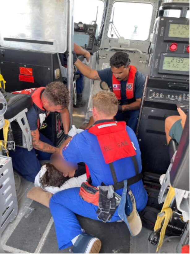 A Coast Guard Station St. Petersburg boat crew rescued a boy after he was injured in a collision between two boats 13 miles northwest of Egmont Key, Florida, Aug. 12, 2023.  Coast Guard Sector St. Petersburg watchstanders were notified that upon both vessels colliding a 14-year-old boy fell overboard and sustained lacerations to his arm from a propeller.  (U.S. Coast Guard photo.)