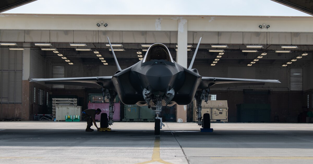 An  F-35A Lightning II sits in a hangar.