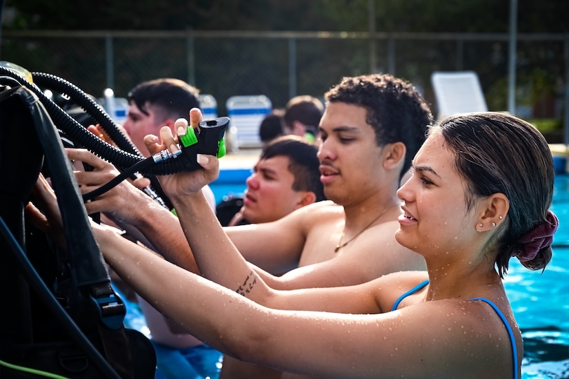 Service members assigned to Joint Base McGuire-Dix-Lakehurst participate in a scuba diving certification training during a Better Opportunities for Single Service Members event on 28, July 2023, at Army Support Activity Fort Dix. The BOSS program provides activities to single service members in the dorms, single parents, and geographical bachelors. These events include life skills, outdoor recreation, leisure activities, and community service opportunities.