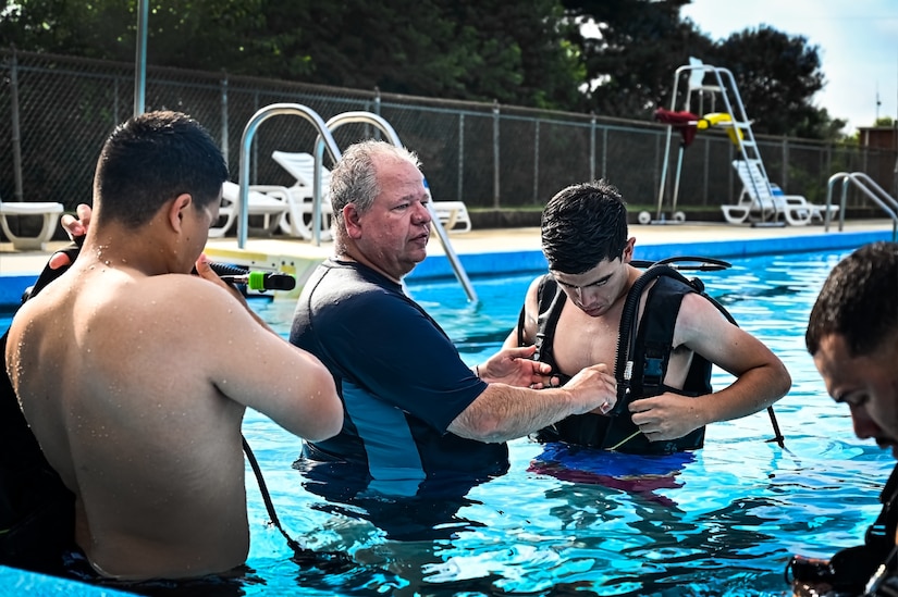 Service members assigned to Joint Base McGuire-Dix-Lakehurst participate in a scuba diving certification training during a Better Opportunities for Single Service Members event on 28, July 2023, at Army Support Activity Fort Dix. The BOSS program provides activities to single service members in the dorms, single parents, and geographical bachelors. These events include life skills, outdoor recreation, leisure activities, and community service opportunities.