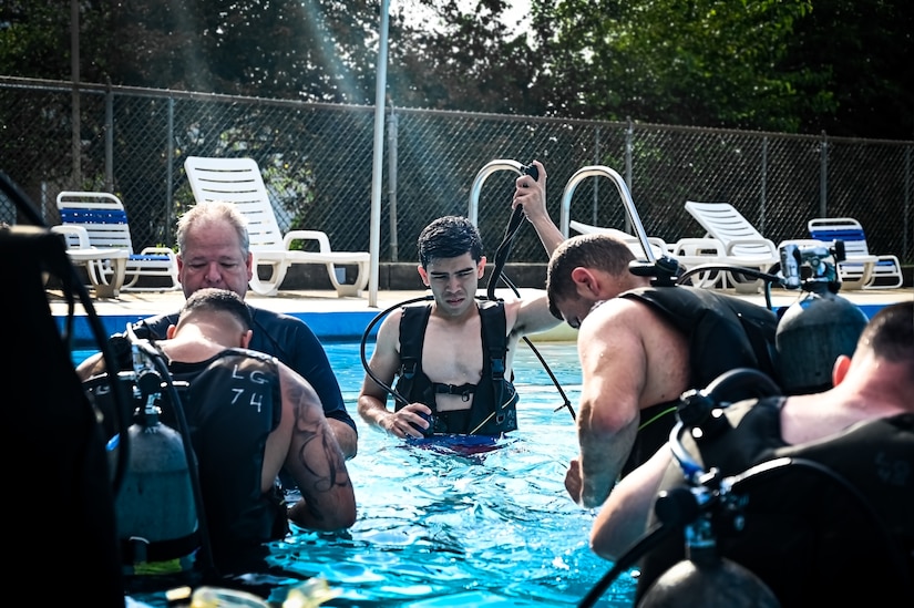 Service members assigned to Joint Base McGuire-Dix-Lakehurst participate in a scuba diving certification training during a Better Opportunities for Single Service Members event on 28, July 2023, at Army Support Activity Fort Dix. The BOSS program provides activities to single service members in the dorms, single parents, and geographical bachelors. These events include life skills, outdoor recreation, leisure activities, and community service opportunities.