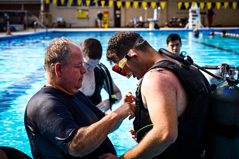 Service members assigned to Joint Base McGuire-Dix-Lakehurst participate in a scuba diving certification training during a Better Opportunities for Single Service Members event on 28, July 2023, at Army Support Activity Fort Dix. The BOSS program provides activities to single service members in the dorms, single parents, and geographical bachelors. These events include life skills, outdoor recreation, leisure activities, and community service opportunities.