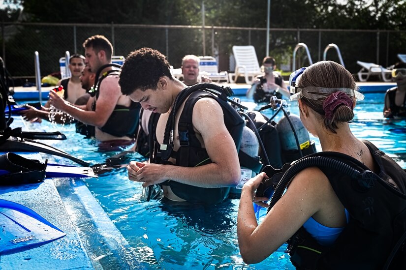 Service members assigned to Joint Base McGuire-Dix-Lakehurst participate in a scuba diving certification training during a Better Opportunities for Single Service Members event on 28, July 2023, at Army Support Activity Fort Dix. The BOSS program provides activities to single service members in the dorms, single parents, and geographical bachelors. These events include life skills, outdoor recreation, leisure activities, and community service opportunities.