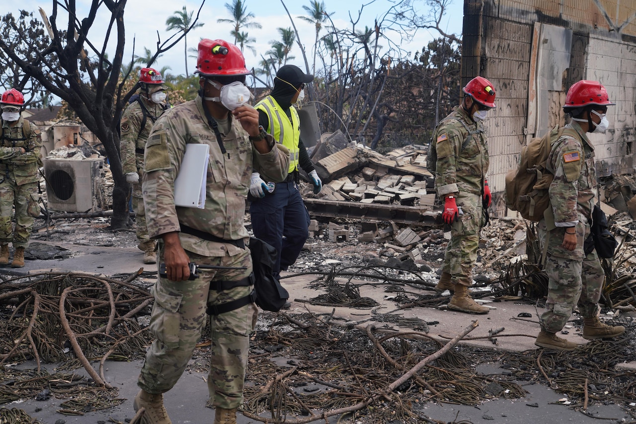 National Guard and local officials assess wildfire damage in Maui, Hawaii.
