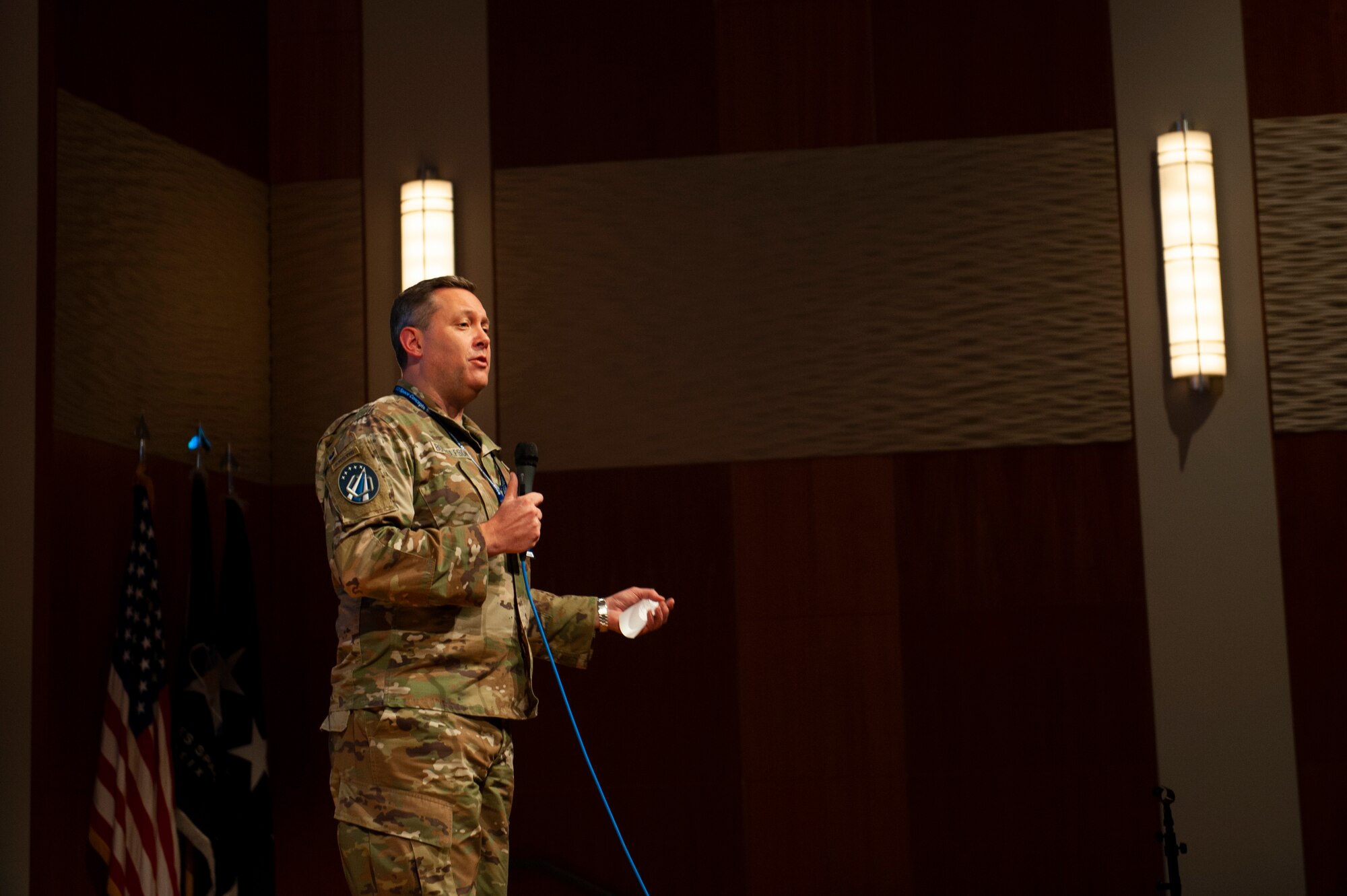 U.S. Space Force Col. Carl Bottolfson, Director of Futures and Integration at Headquarters, U.S. Space Force, provides remarks during the inaugural U.S. Space Force Tactics Development Conference at the National Air and Space Intel Center, Wright Patterson Air Force Base, Ohio, July 26, 2023. Drawing a crowd of 240 attendees, the conference aimed to present the previous year's findings from the U.S. Space Force’s Mission Focused Working Groups and Tactics Improvement Proposals to senior leadership. (U.S. Air Force photo by Senior Airman Kristof Rixmann)