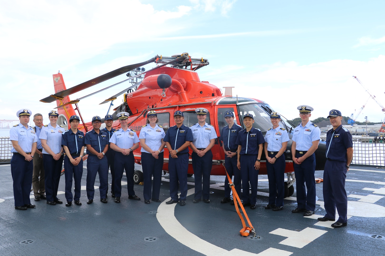 U.S. Coast Guard Cutter Munro command staff stand with Capt. Tetsuhiro Nakagawa, the Director for International Strategy for the Japan Coast Guard, and officers from the Japan Coast Guard after touring the Munro during the cutter’s port call to Yokosuka, Japan, Aug. 8, 2023. Yokosuka was Munro’s first international port call during their months-long deployment to the Indo-Pacific region. (U.S. Coast Guard photo)