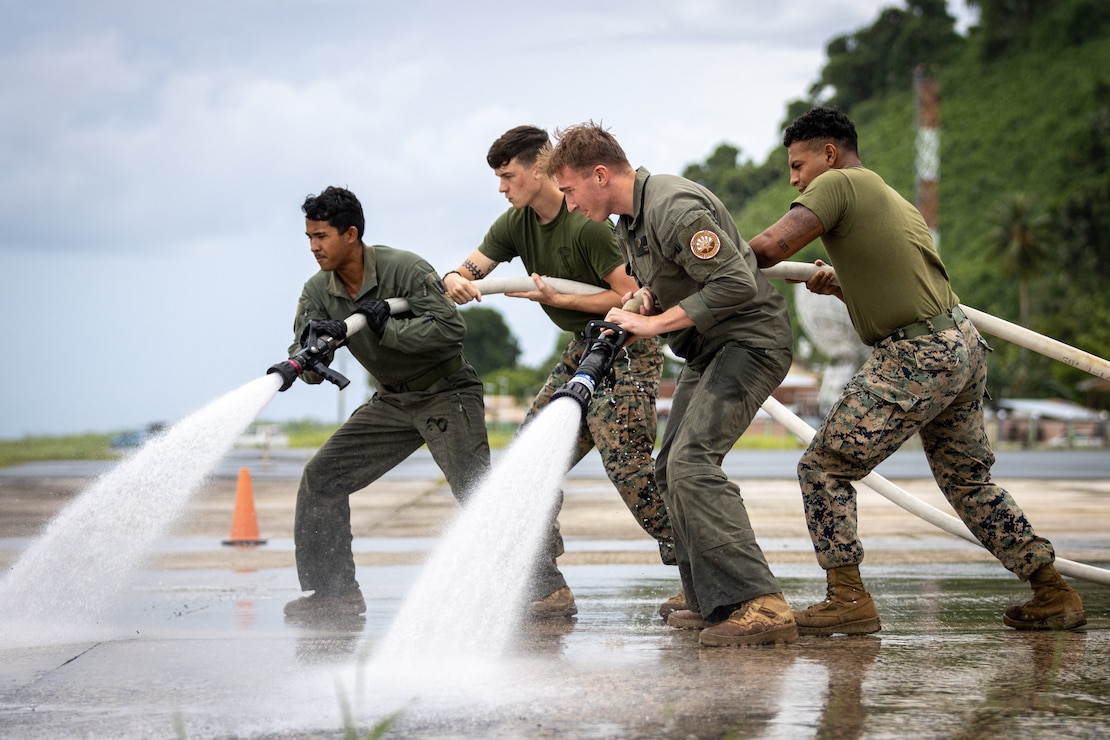 U.S. Marines with Task Force Koa Moana 23, execute a training session with team members of the Chuuk Aircraft Rescue and Fire Fighting station at the Chuuk International Airport on Weno, Chuuk, Federated States of Micronesia, Aug. 8, 2023. The island of Chuuk is a part of Task Force Koa Moana’s deployment throughout the Indo-Pacific region, where Marines and Sailors from I Marine Expeditionary Force work to strengthen alliances and partnerships with development of interoperable capabilities, combined operations, theater security cooperation, and capacity-building efforts.