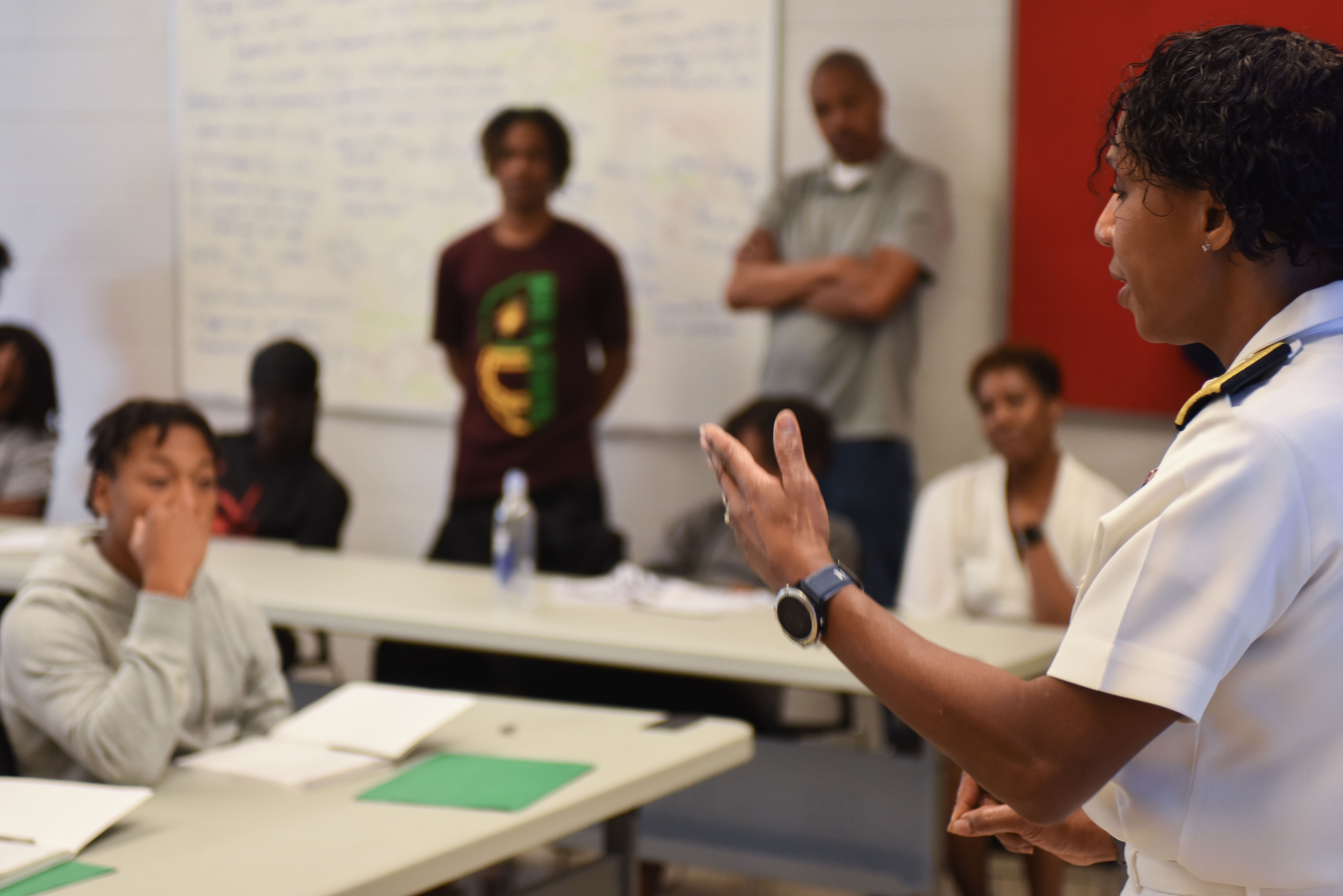 Rear Adm. Tracy Hines, a Columbus native and Navy cyber security division director, Office of the Chief of Naval Operations, Washington, D.C., speaks with high school students at the Ohio State University during a Navy Community Outreach Executive Engagement visit Tuesday, June 20, 2023 .