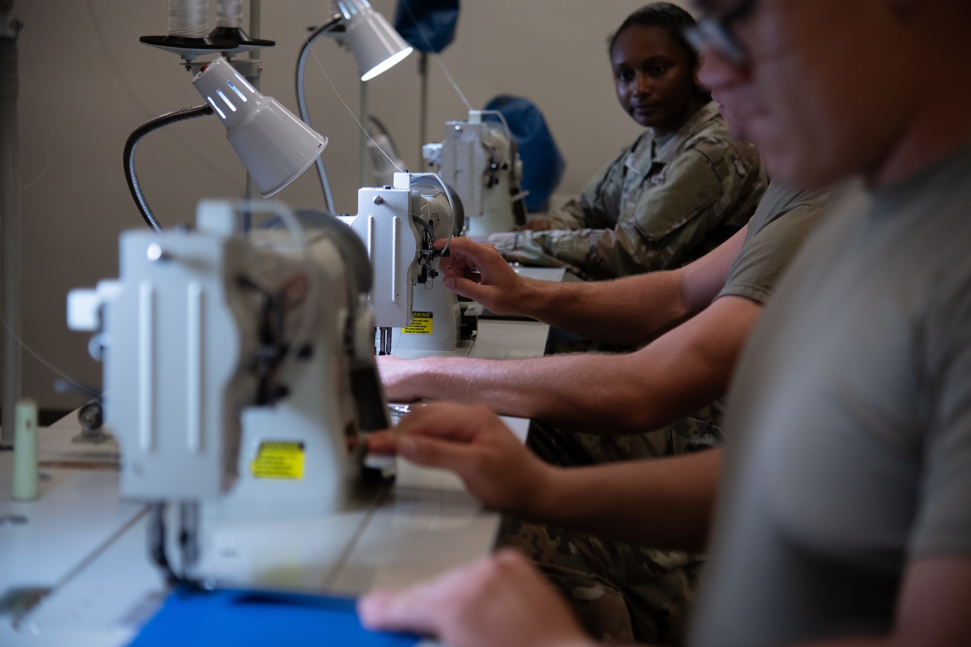 A female Airman looks at the camera.