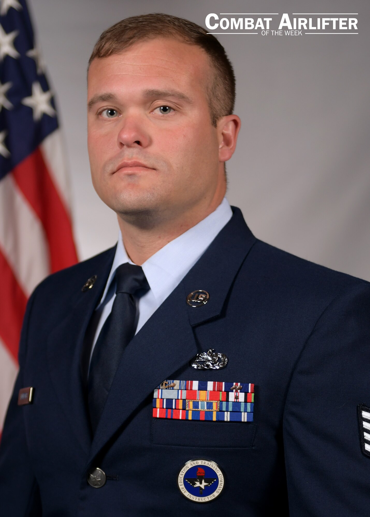 A man in uniform poses for a photo