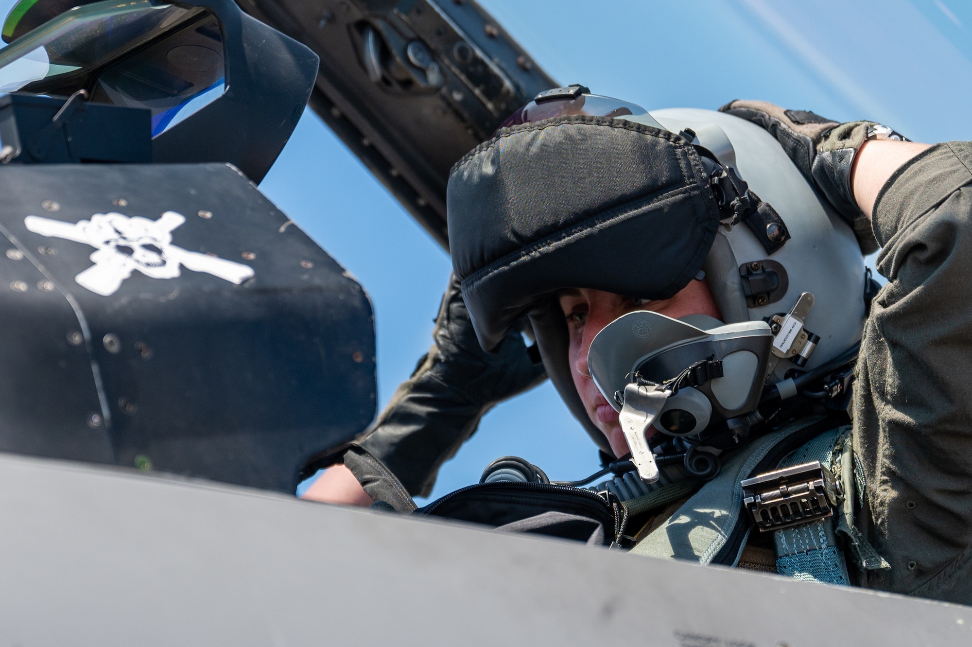 Capt. Megan Langas dons her helmet before take-off during a U.S.-Republic of Korea Buddy Squadron event.