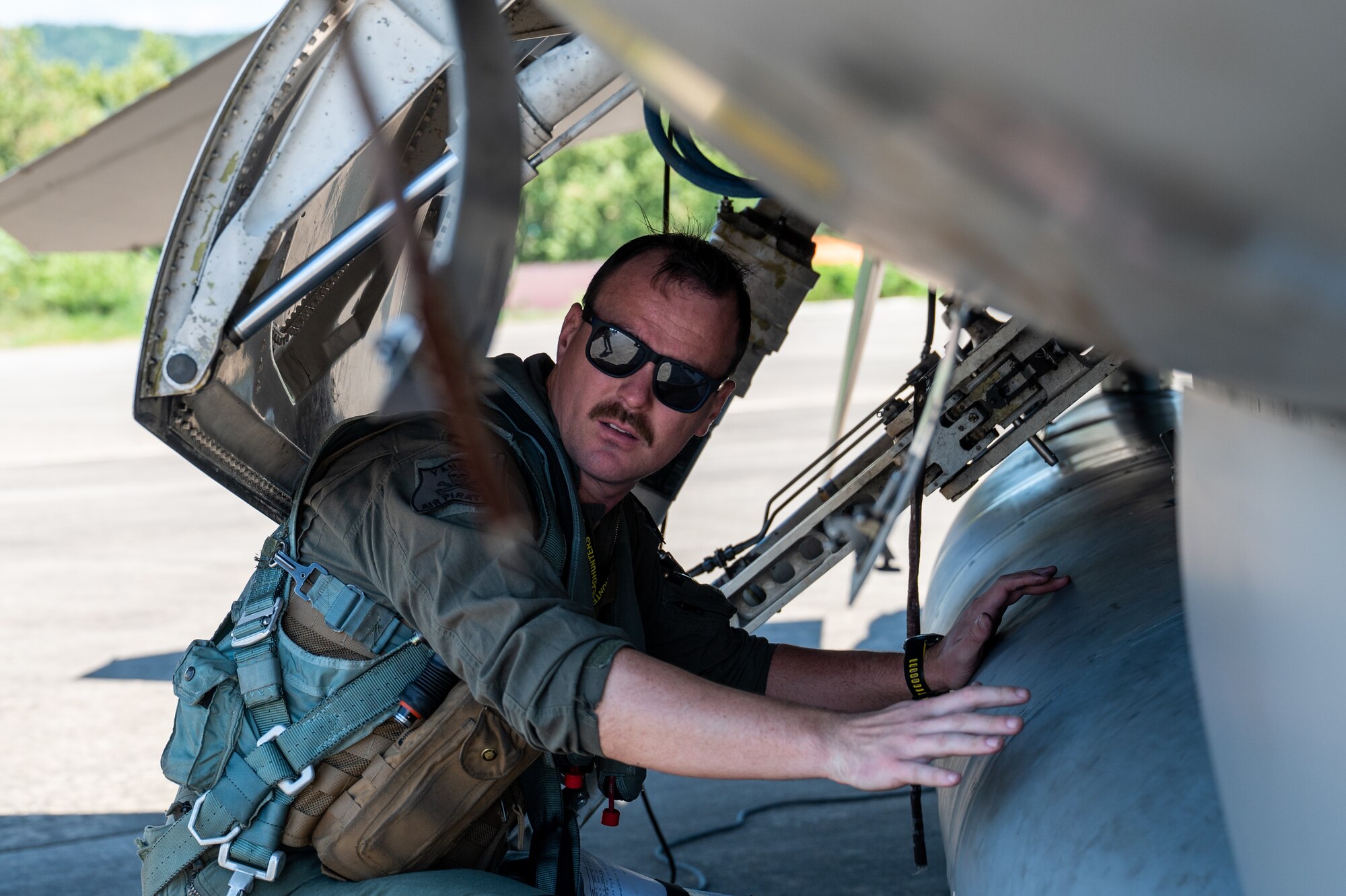 Capt. Jonathon Clements inspects a U.S. Air Force F-16 Fighting Falcon before take-off during a U.S.-Republic of Korea Buddy Squadron event.