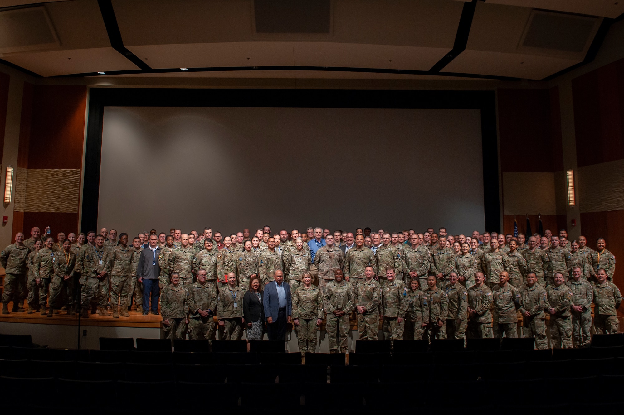 Attendees of the U.S. Space Force's inaugural Tactics Development Conference pose for a group photo at the National Air and Space Intel Center, Wright Patterson Air Force Base, Ohio, July 28, 2023. Drawing a crowd of 240 attendees, the conference aimed to present the previous year's findings from the U.S. Space Force’s Mission Focused Working Groups and Tactics Improvement Proposals to senior leadership. (U.S. Air Force photo by Senior Airman Kendall Stuckman)