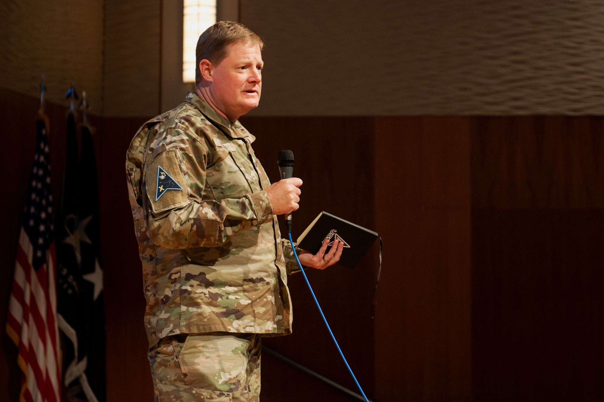 U.S. Space Force Col. Jack Fulmer, Space Delta 10 commander, provides opening remarks during the inaugural U.S. Space Force Tactics Development Conference at the National Air and Space Intel Center, Wright Patterson Air Force Base, Ohio, July 26, 2023. Drawing a crowd of 240 attendees, the conference aimed to present the previous year's findings from the U.S. Space Force’s Mission Focused Working Groups and Tactics Improvement Proposals to senior leadership. (U.S. Air Force photo by Senior Airman Kristof Rixmann)