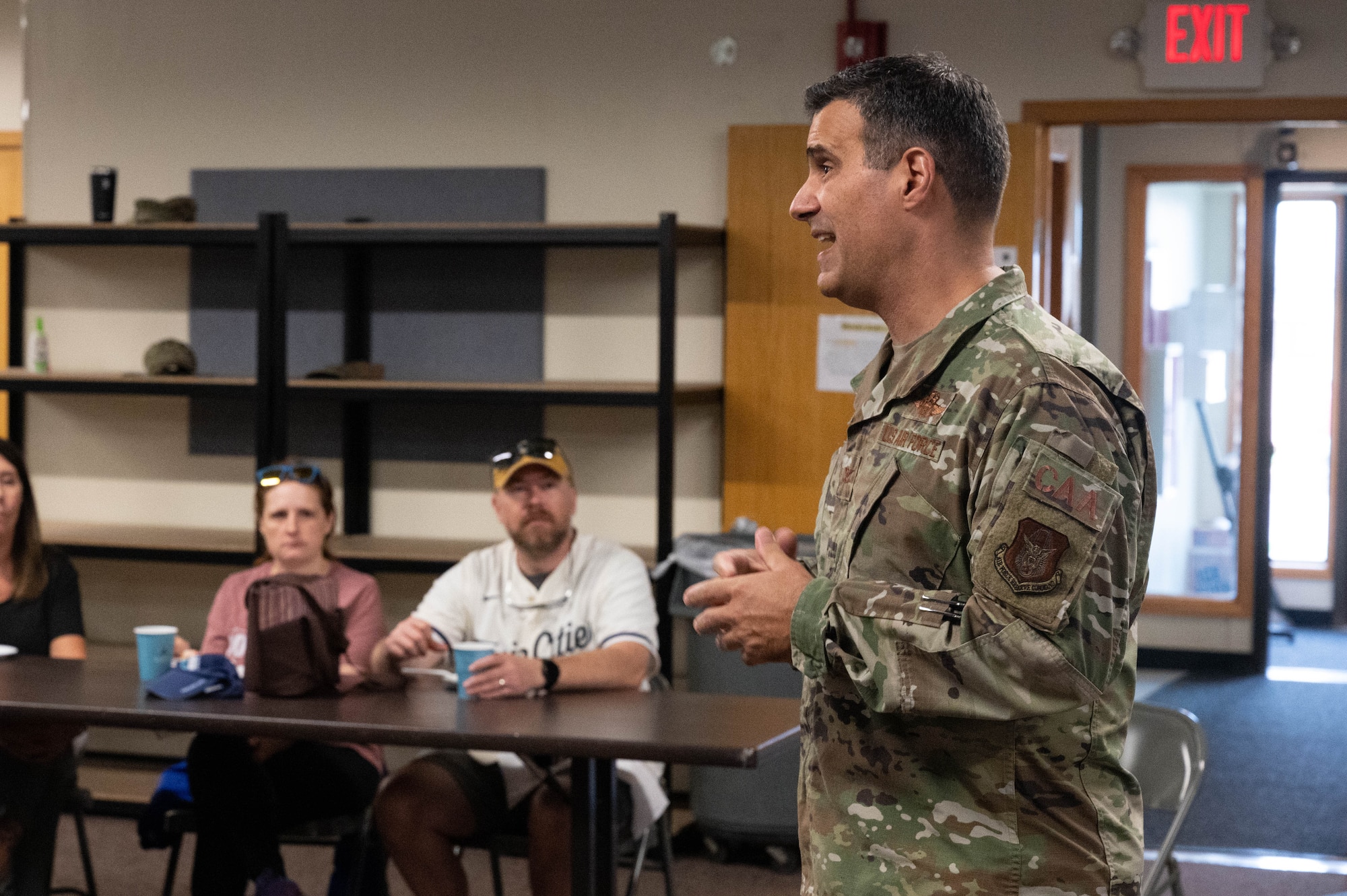 Col. Ethan Hinkins, 934th Airlift Wing commander, speaks to employers during the annual Employers Day at Minneapolis-St. Paul Air Reserve Station, Minn. Aug. 5, 2023. Employers Day is an opportunity for 934 AW Airmen to invite their civilian employers to a base event to thank them for their support. (U.S. Air Force photo by Senior Airman Victoriya Tarakanova)